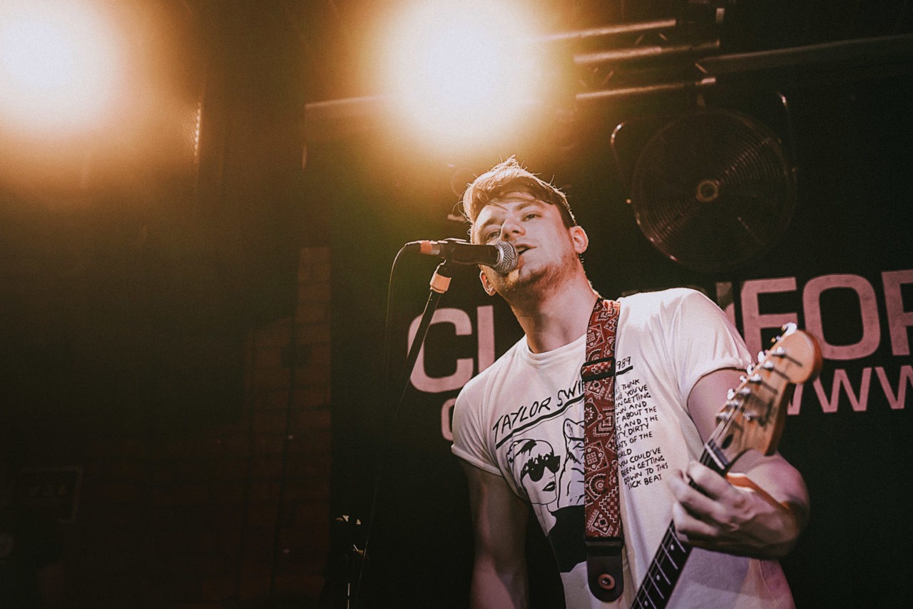 Liam from Birdcage on stage with guitar at Clwb Ifor Bach, Cardiff