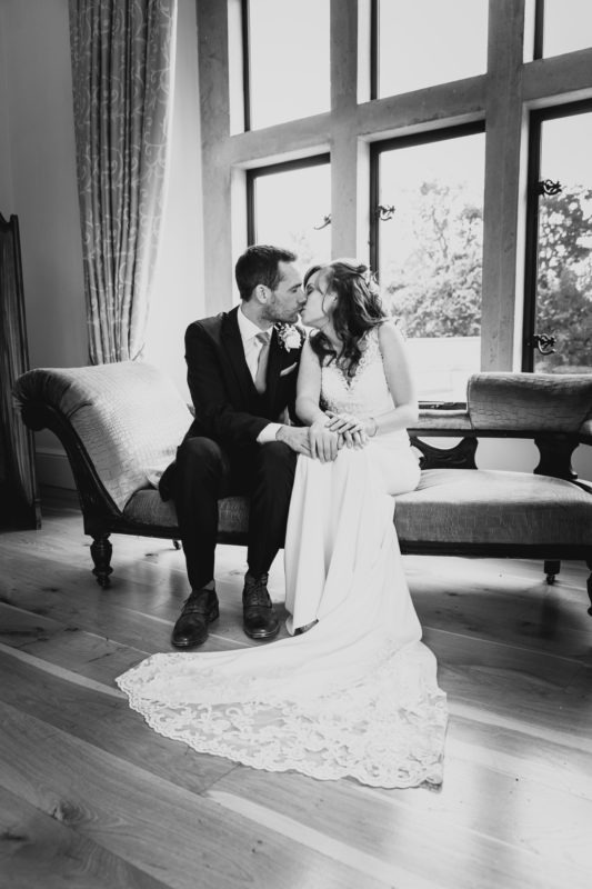 The happy couple sharing a kiss
