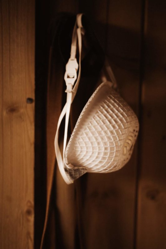 Dusk mask hanging up on a hook