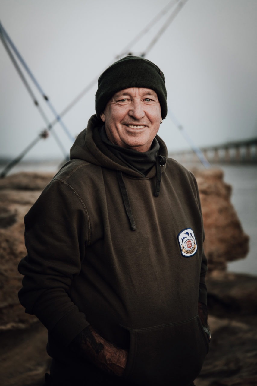 Friendly fisherman, John, smiling at the camera