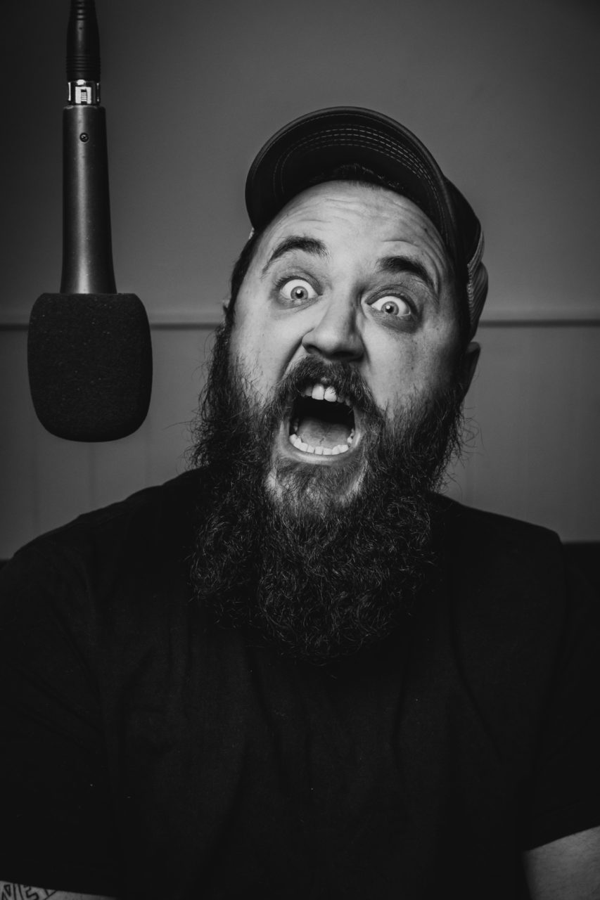 Podcast host pulling a silly face