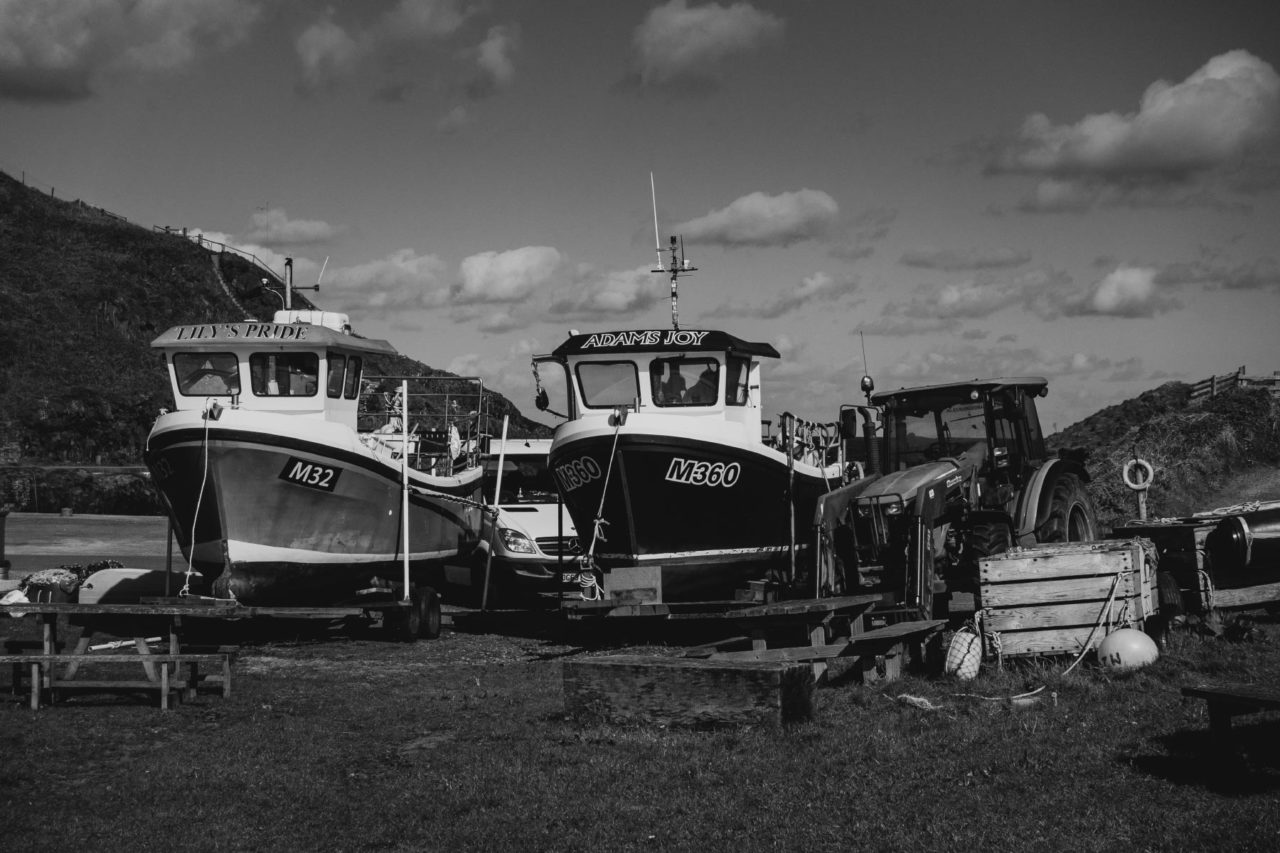 Tug boats moored in the harbour at Porthgain