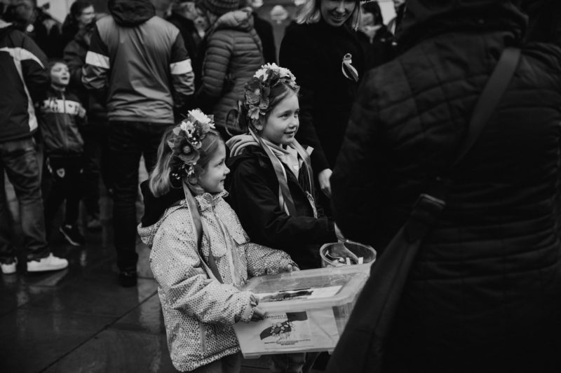 Young Ukrainian girls with flowery head bands collecting money