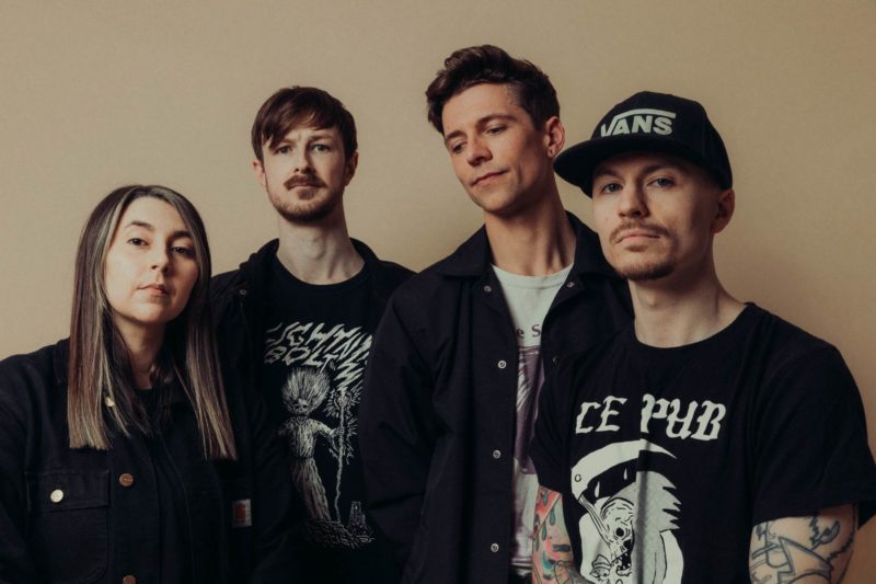 Emo punk band stood posing in Citrus Studio for a promo marketing shoot