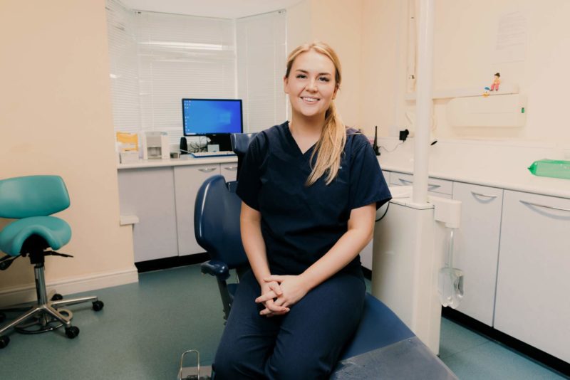 Professional portrait of a member of staff smiling. Shot for teeth For Life in Caldicot, December 2023.